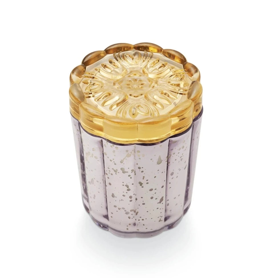 Illume Lavender La La Flourish Glass Candle | Close up shot of the mustard yellow flower lid.