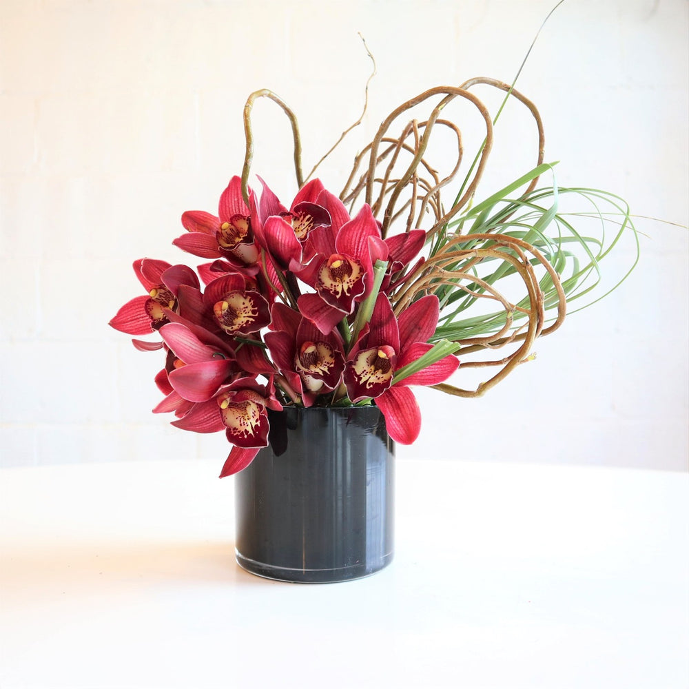 Orchid Delight | Red orchids with manipulated branching and grasses.