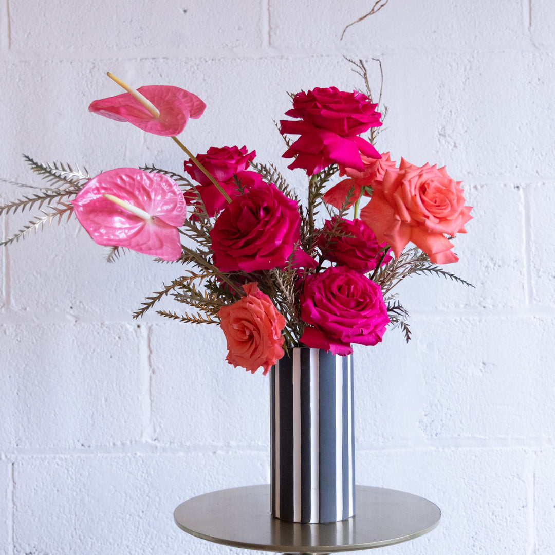 Arrangement of pink and red flowers