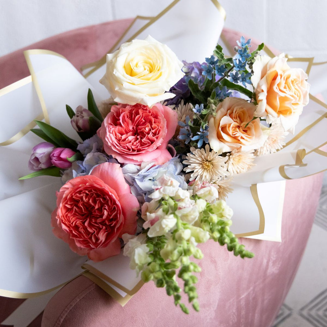 Bouquet of flowers on a decorative surface with geometric patterns