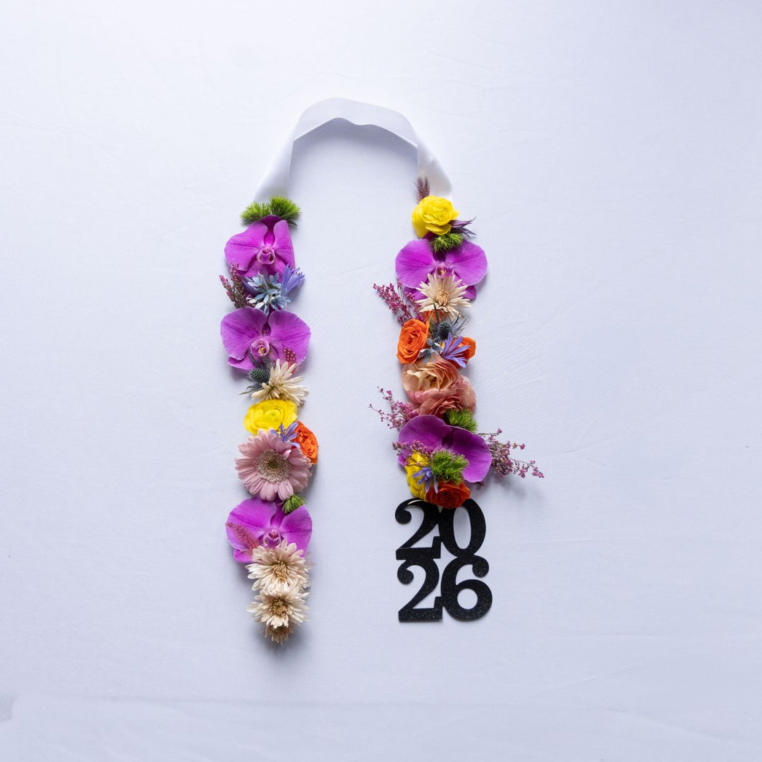 Colorful floral graduation stole and a black &