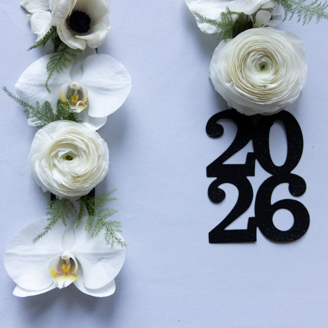 White floral graduation stole with a black &