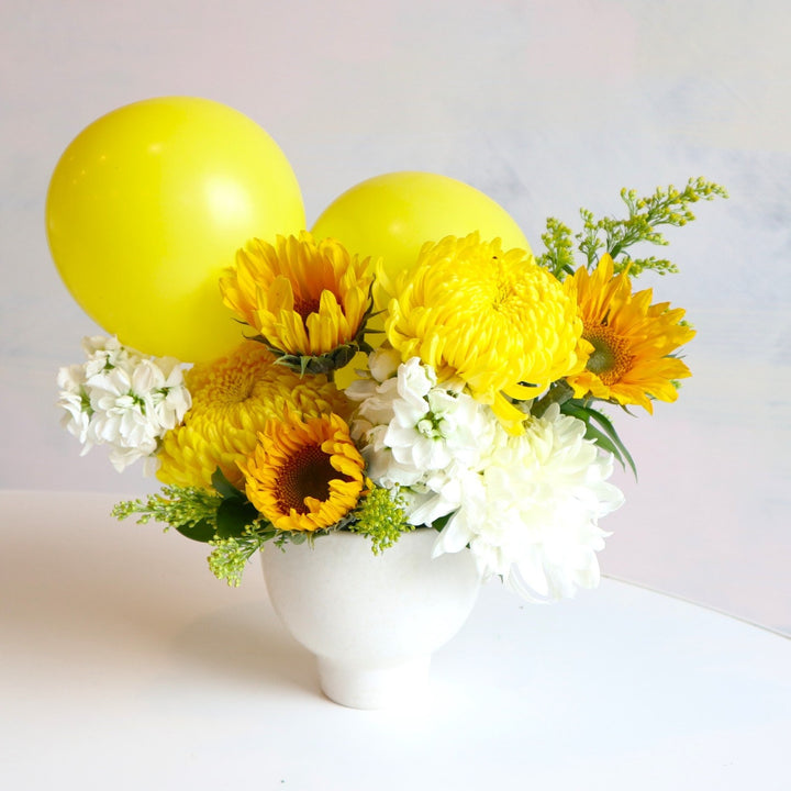 sunflowers, mums, stock with yellow balloons