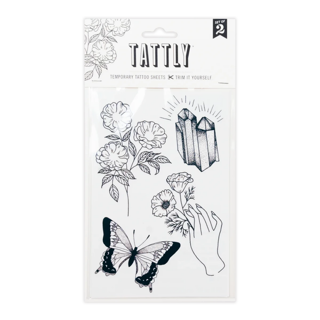 Tattly Tattoos | Temporary Tattoo Sheets | Black line art tattoos, a flower stem, butterfly, crystal, and a hand holding a stem of flowers.
