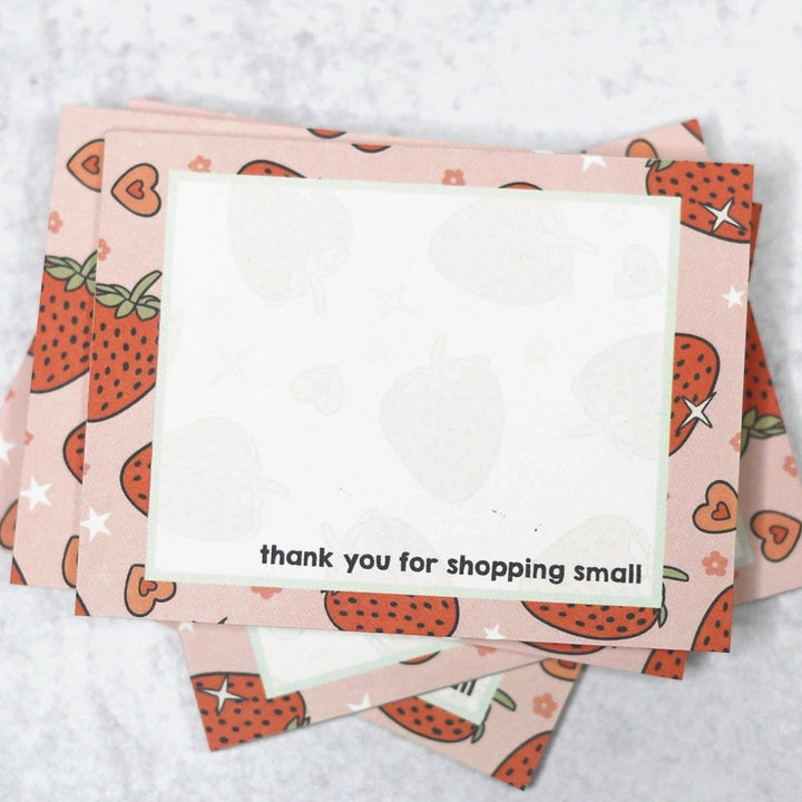 Assorted Sticky Notes | thank you for shopping small | A sticky note decorated with strawberries and hearts. The middle is white with faint strawberry lines and the text "thank you for shopping small".