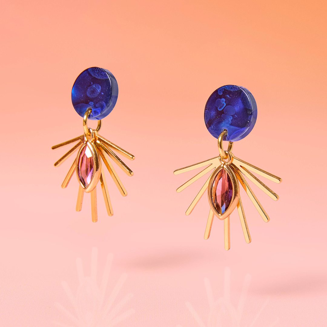 Tribe + Temple | Sun Earrings with a blue base.