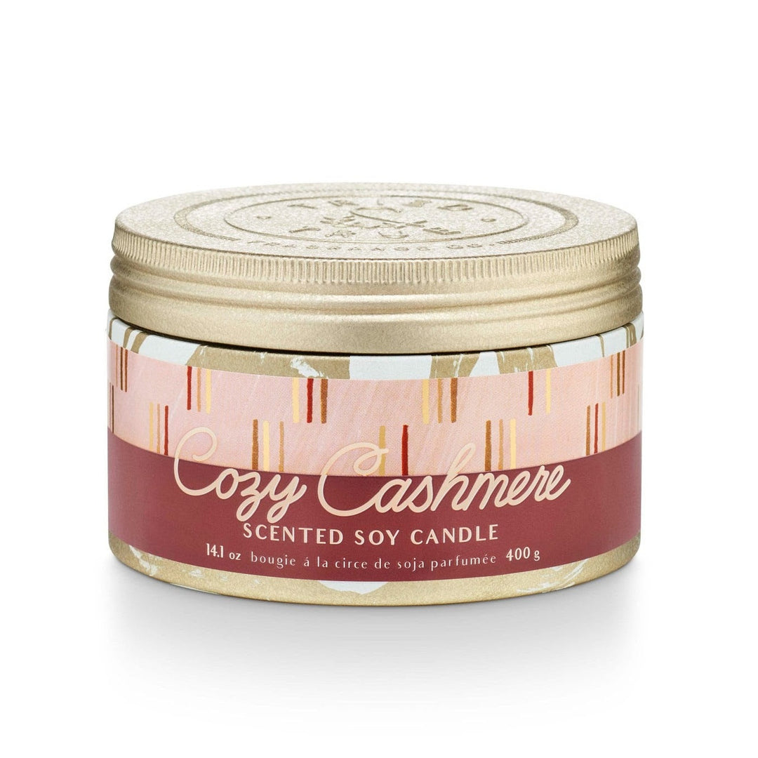 Tried & True Large Tin Candle | Cozy Cashmere | A gold patterned tin with a red/pink/yellow/gold label that reads "Cozy Cashmere, Scented Soy Candle, 14.1 oz, bougie a la circe de soja parfumee 400g".
