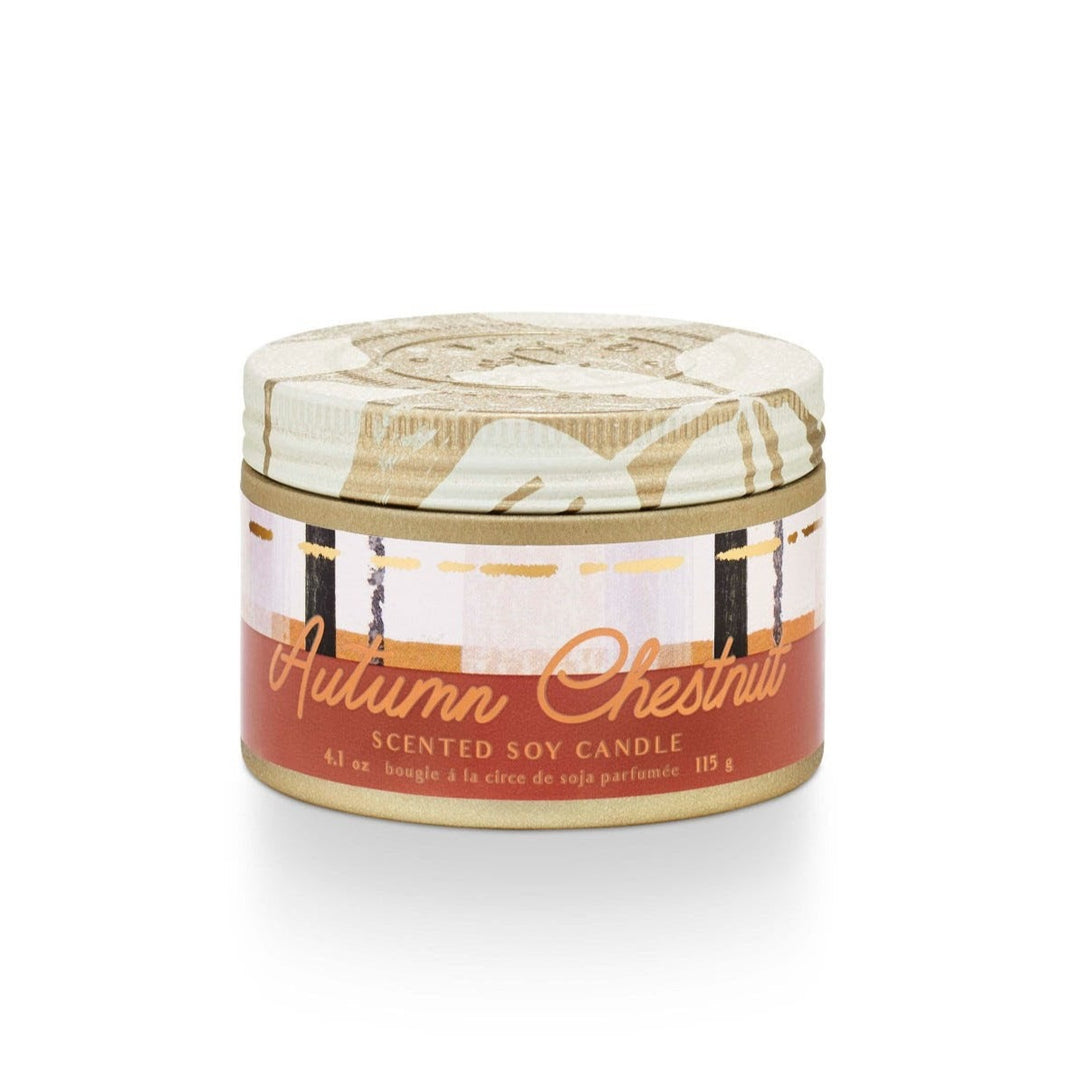 Tried & True Small Tin Candle | Autumn Chestnut | A gold tin with a red, orange, white, black and gold label that reads "Autumn Chestnut, Scented soy candle, 4.1 oz, bougie a la circe de soja parfumee 115g.