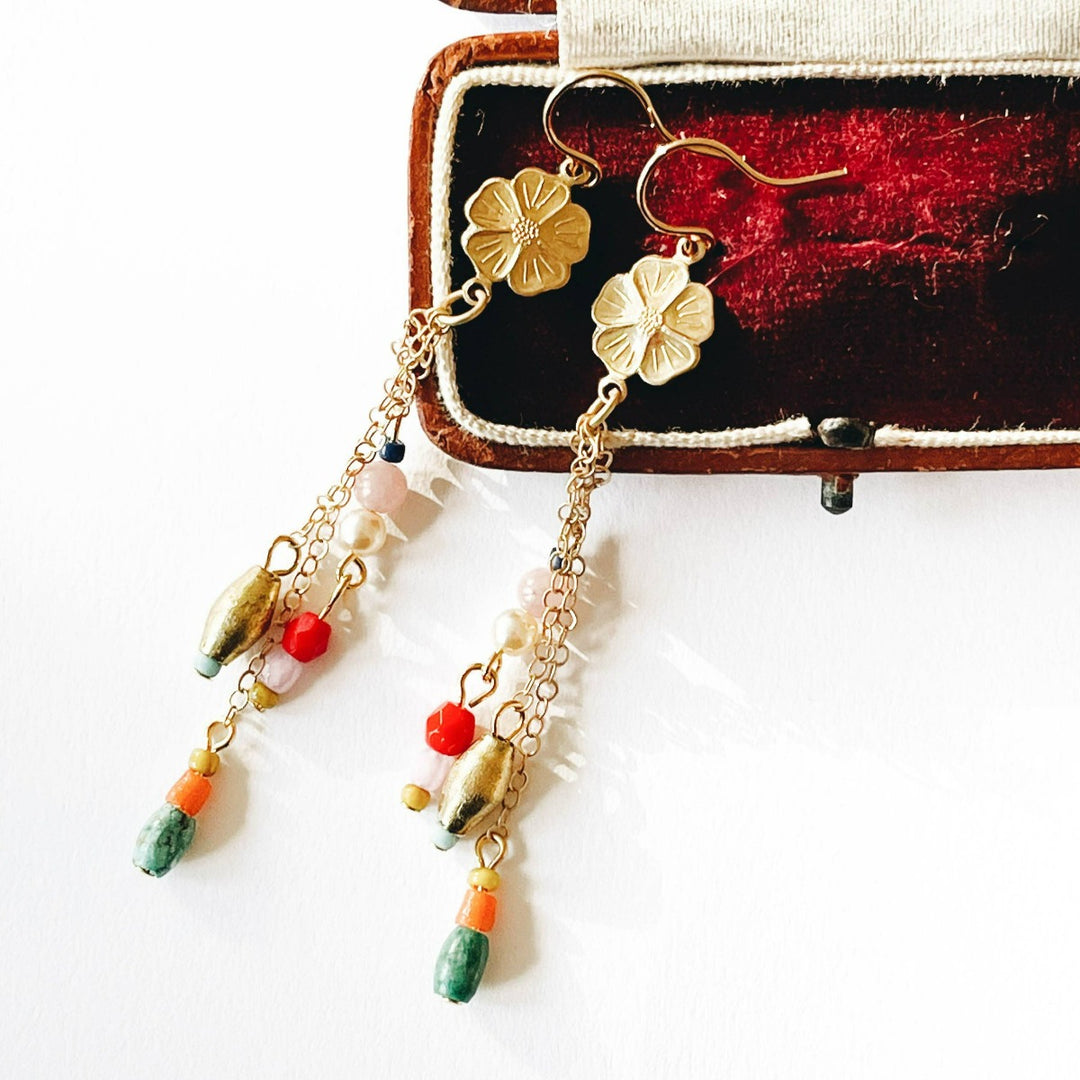 Nest Pretty Things | Long Flower Charm Earrings | A beaded dangling earring with flower accents.