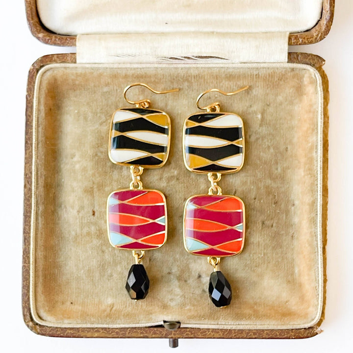 Nest Pretty Things | Long Statement Retro Dangle Earrings | Black, yellow, white, pink, orange, and blue earrings with gold accents.