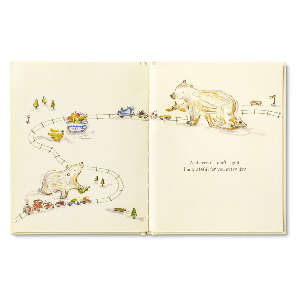 Because Of You, Mom | Open book spread of the mom and child polar bears playing with a train set. Text on the page reads "And even if I don't say, I'm grateful for you every day.".