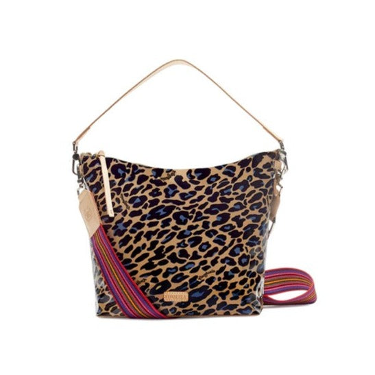 Blue Jag Hobo | Consuela | A nude bag with black and blue spots, nude accents, and a multi color strap.