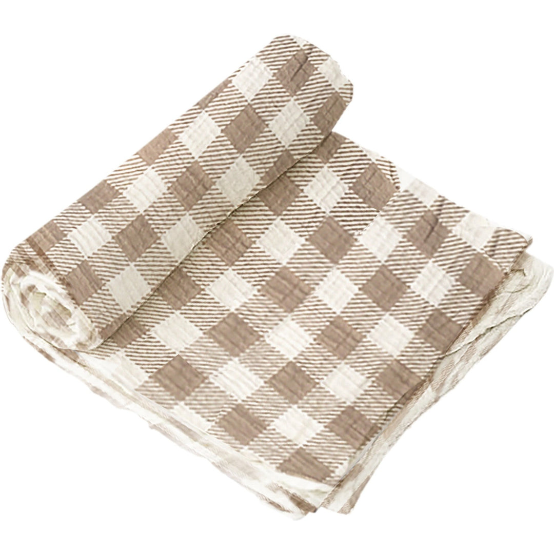 Swaddle and Rattle Set | Photo of the blanket, checkered with white and tan.