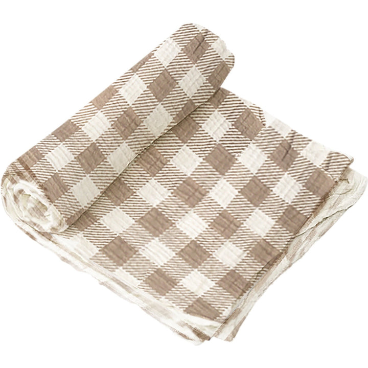 Swaddle and Rattle Set | Photo of the blanket, checkered with white and tan.