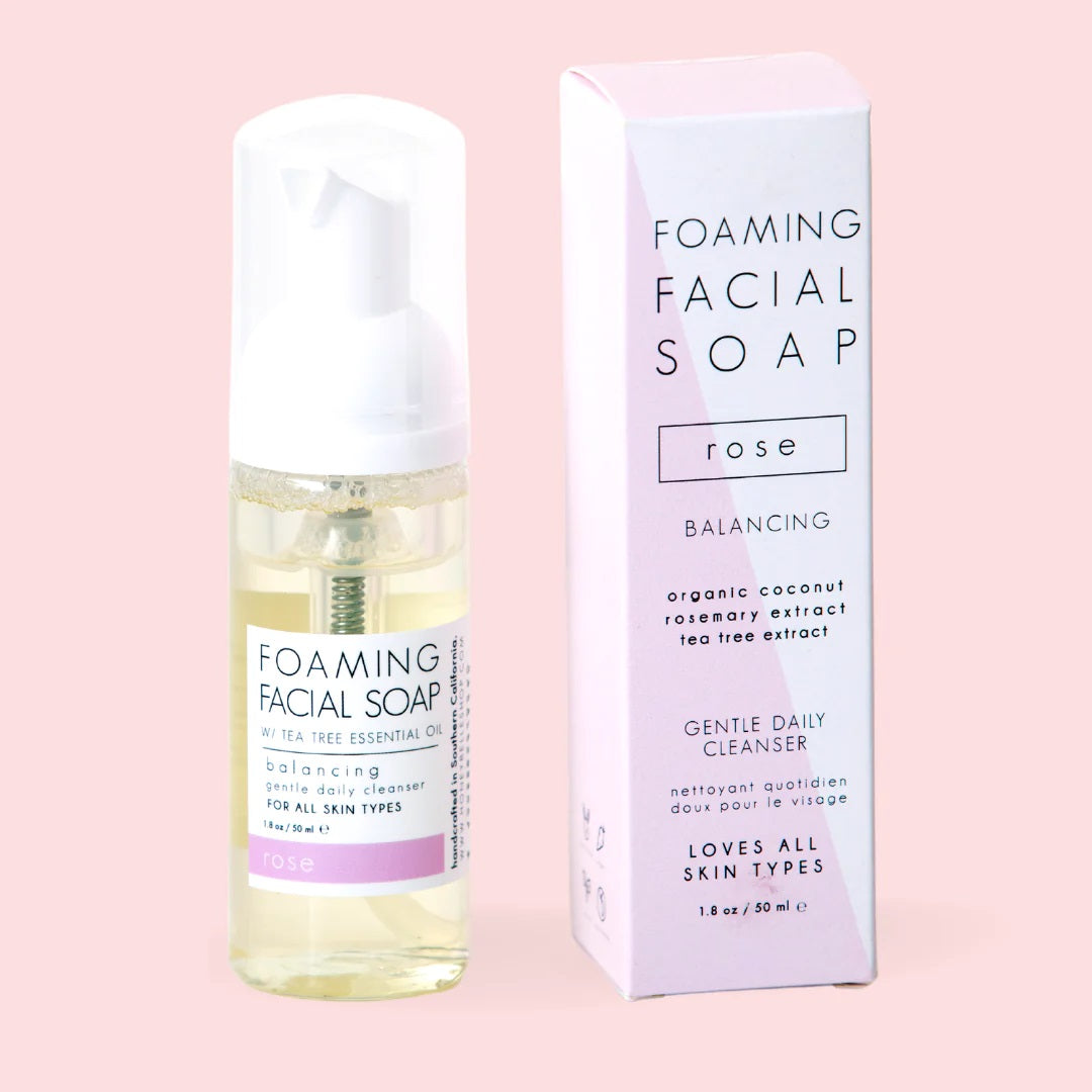 Foaming Facial Soap | Honey Belle | Bottle and box side by side. Simple white and pink packaging, organic coconut, rosemary extract, tea tree extract. Gentle Daily Cleanser.