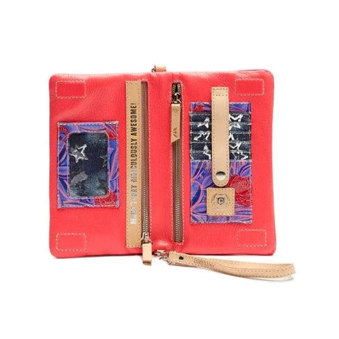 Maron Uptown Crossbody Bag | Consuela | Open bag showing card holder and ID space in purple/pink/blue pattern. Nude accents and text reading "Make Today Ridiculously Awesome!".