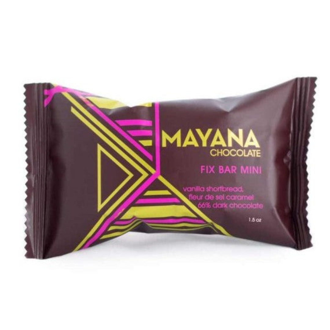 Mayana Mini Fix Bar Mini - vanilla shortbread, fleur de sel caramel, 66% dark chocolate, 1.5oz. Brown package with gold and pink geometric pattern.