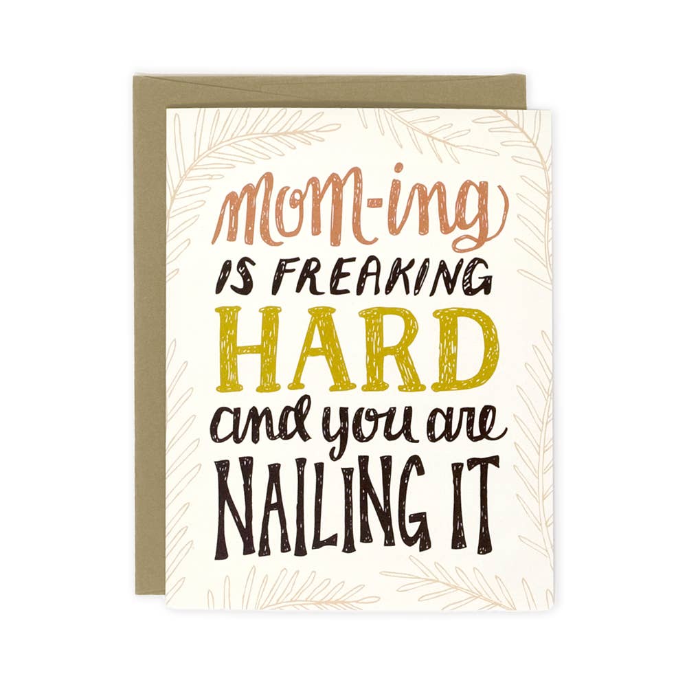 A greeting card "Mom-ing is freaking hard and you are nailing it"