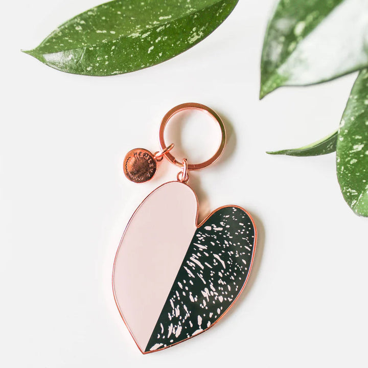 Hemleva Keychains | Pink Princess plant leaf, green with pink speckles on the right side and solid pink on the other. Accented with rose gold key ring.