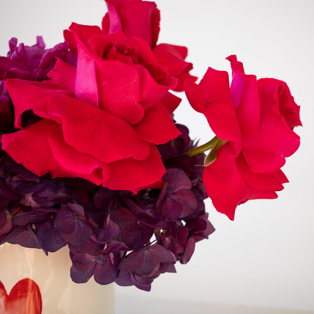 Florist Rochester NY with all red roses and purple hydrangea in a heart vase.  Valentines Florist | Monroe County Florist 
