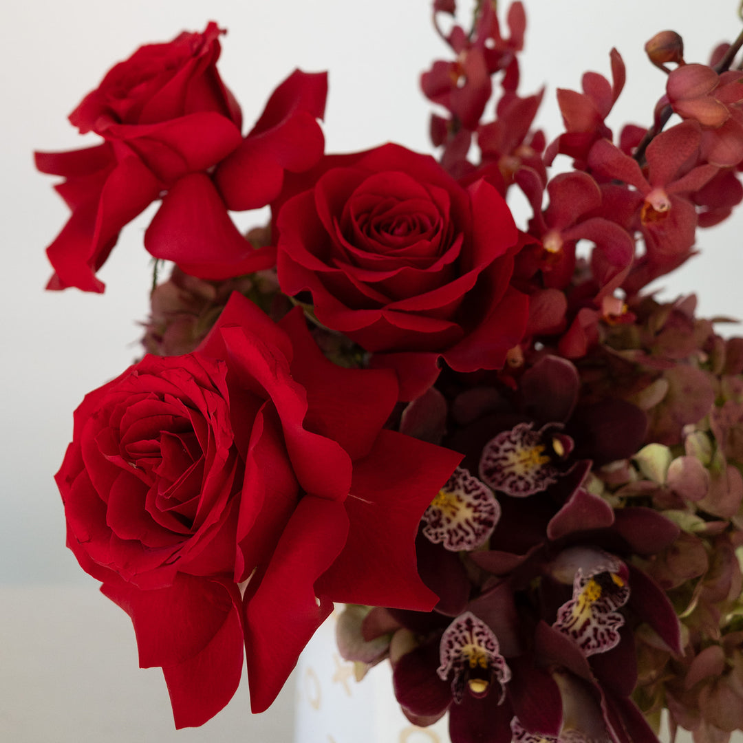 Red Rose and orchid vased arrangement. Valentines Flower Delivery 