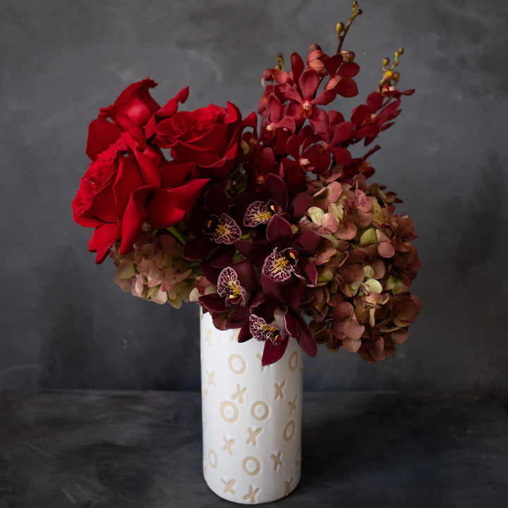 xo vase with all red flowers for Valentines day flower delivery 