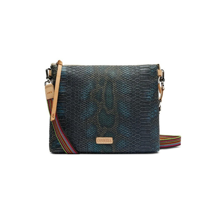 Rattler Downtown Crossbody | Consuela | A rattle snake pattern crossbody bag with Diego leather accents and a multi color crossbody strap.
