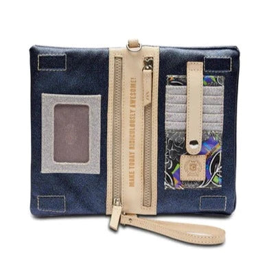 Starlight Uptown Crossbody Bag | Consuela | Open bag revealing a card organizer that is patterned with silver, black, blue, and green. Accents in nude leather with text that says "Make Today Ridiculously Awesome!".