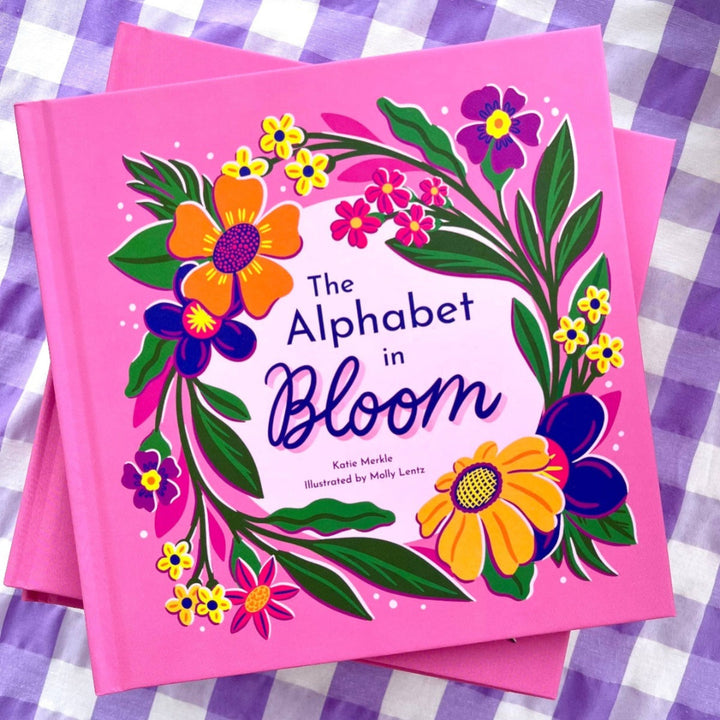 The Alphabet in Bloom is a 7x7 hardcover flower alphabet book with boldly illustrated design.