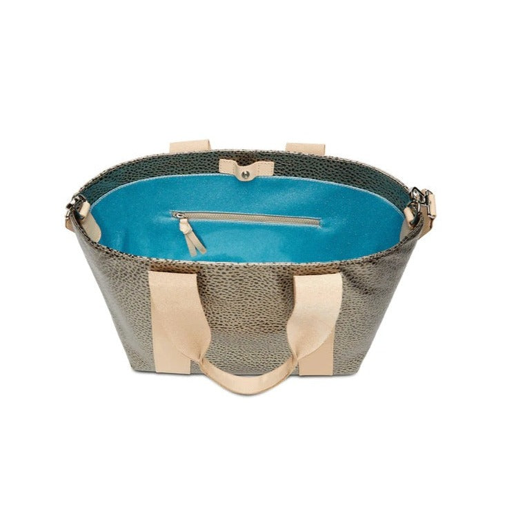 Tommy Carryall | Consuela | Top view of the carryall showing the sparkly blue interior with zippered side pouch.