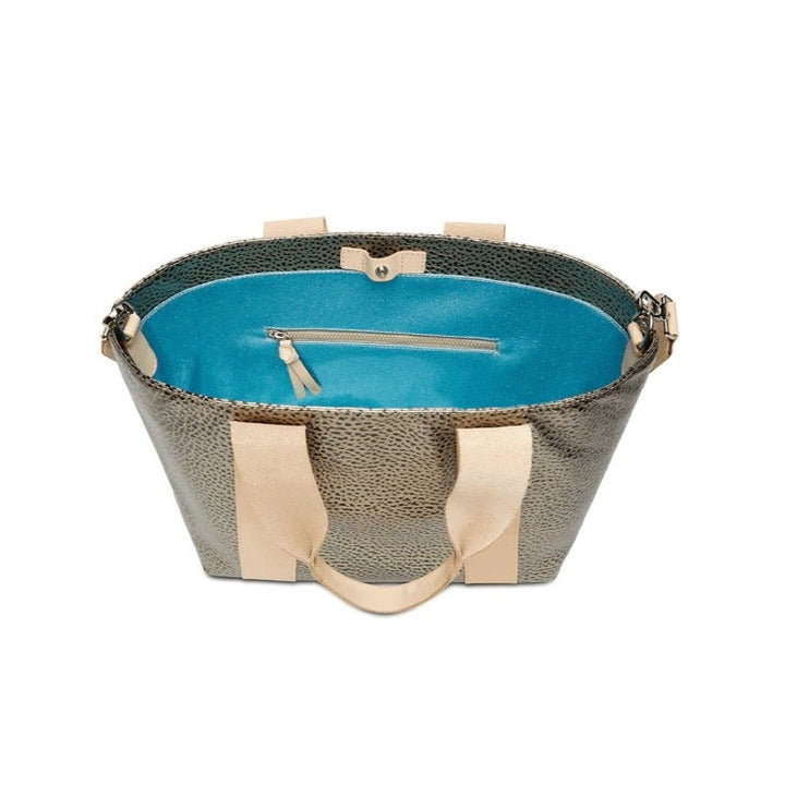 Tommy Carryall | Consuela | Top view of the carryall showing the sparkly blue interior with zippered side pouch.