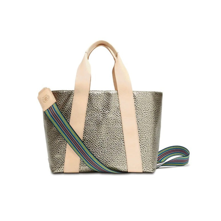 Tommy Carryall | Consuela | A gold and black textured carryall with nude accents/handle with a multi color crossbody strap.