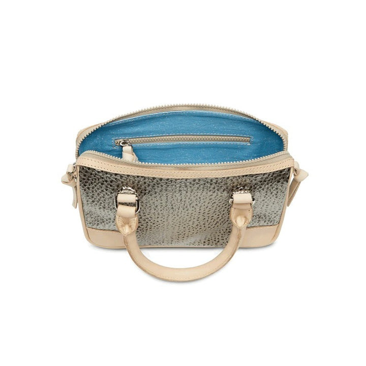 Tommy Luncheon | Consuela | A gold and black textured bag opened up to reveal a sparkly blue interior with a zipper pocket.