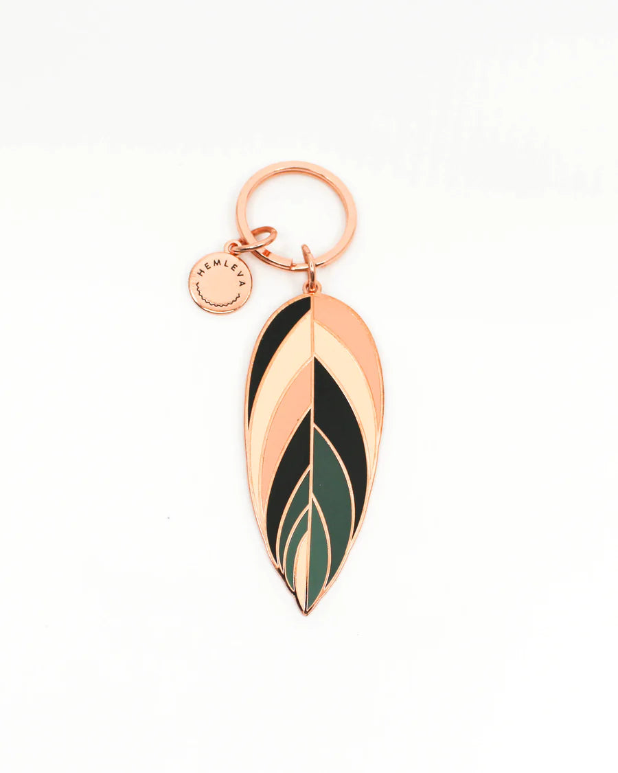 Hemleva Keychains | Triostar leaf in green, pink, yellow, and black. Accented with rose gold key ring.