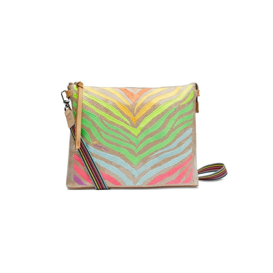 Veronica Downtown Crossbody | Consuela | A sparkly nude color bag with a rainbow zebra pattern, nude accents, and a multicolor crossbody strap.