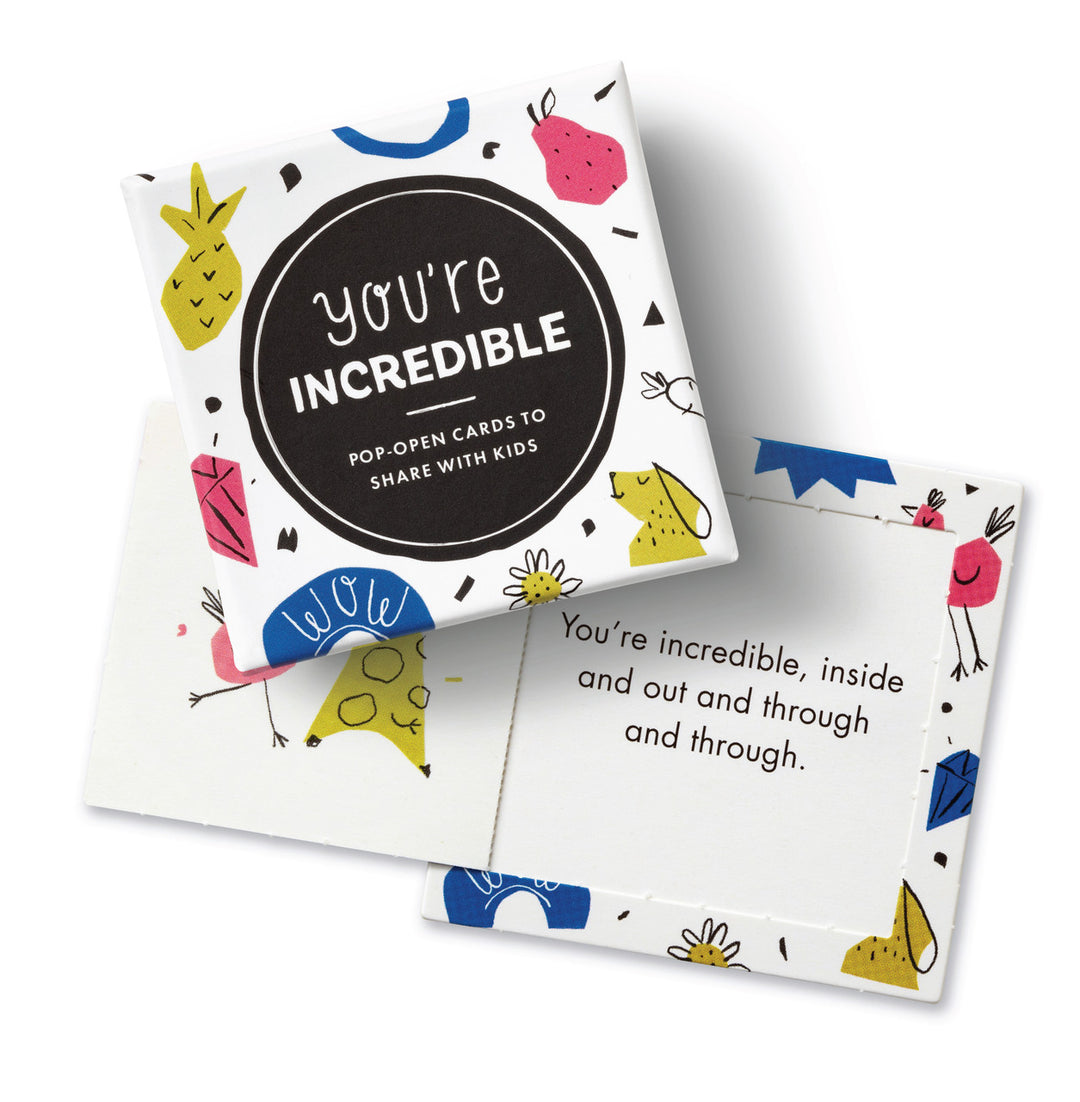 "You're Incredible" Pop-Open Cards | Pop-open cards to share with kids. A white box with yellow, blue, and pink illustrations. Open example card, "You're incredible, inside and out and through and through."