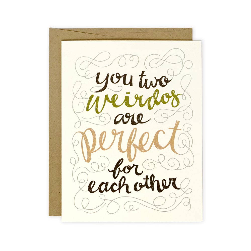A cream card with with abstract lines and text that reads "you two weirdos are perfect for each other".