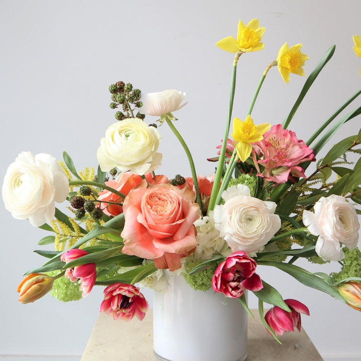 Day Dreaming | Close up on the roses, berries, ranunculus, daffodils, and tulips.