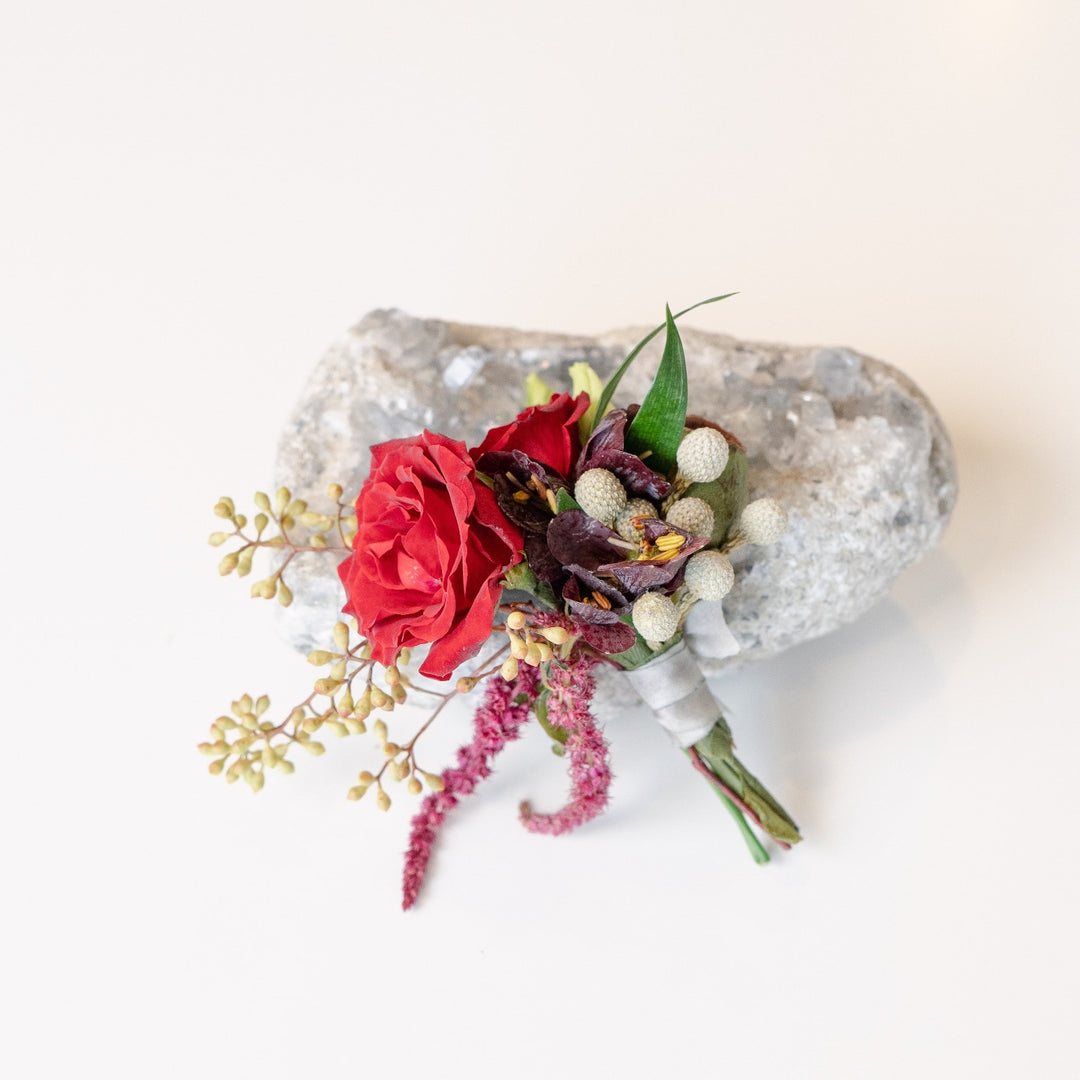 Dark and Moody boutonniere  Rochester NY Florist 