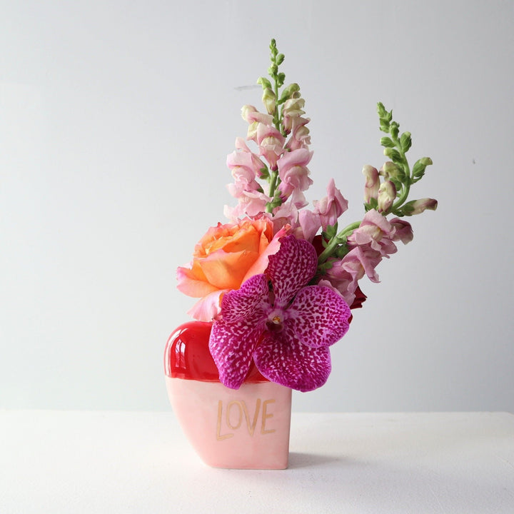 The love bud vase with orchids, roses and snapdragons.  Valentines Day Flowers | Flower Delivery