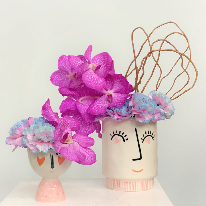 Heart eye vase set with orchids carnations and curly willow