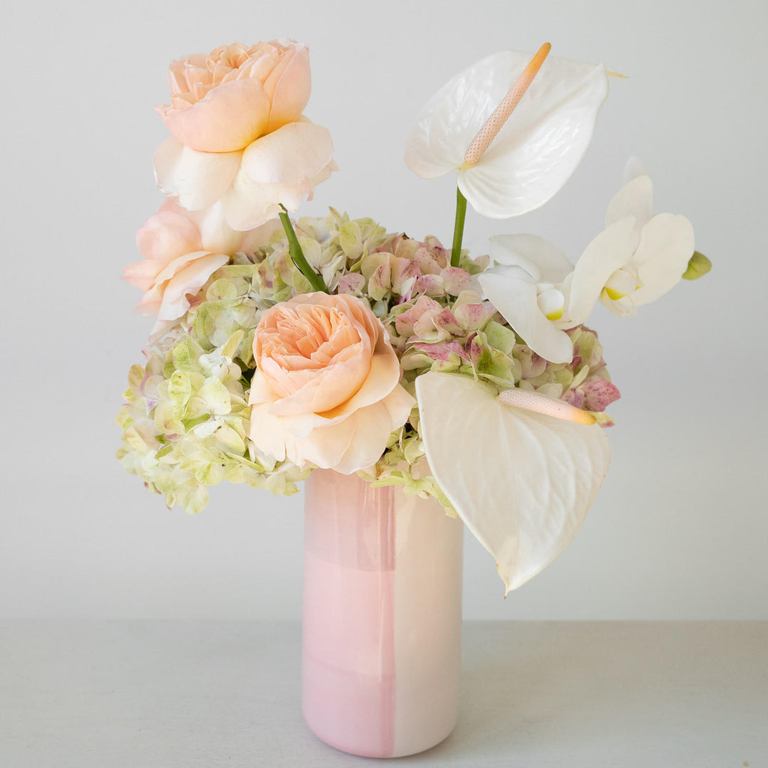 Pink vase with complimenting blooms in peach and pink.  Valentines day flower delivery | Pink flower delivery | Stacy K Floral 
