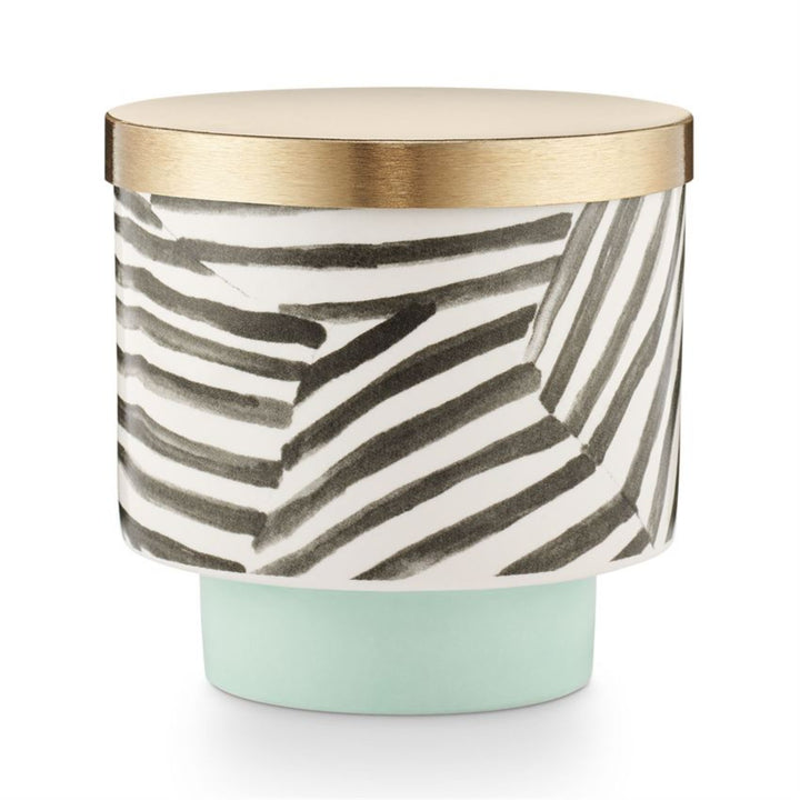 Go Be Lovely Lidded Ceramic Candle - Gold lid, with light teal base, black/white/ zebra print design.