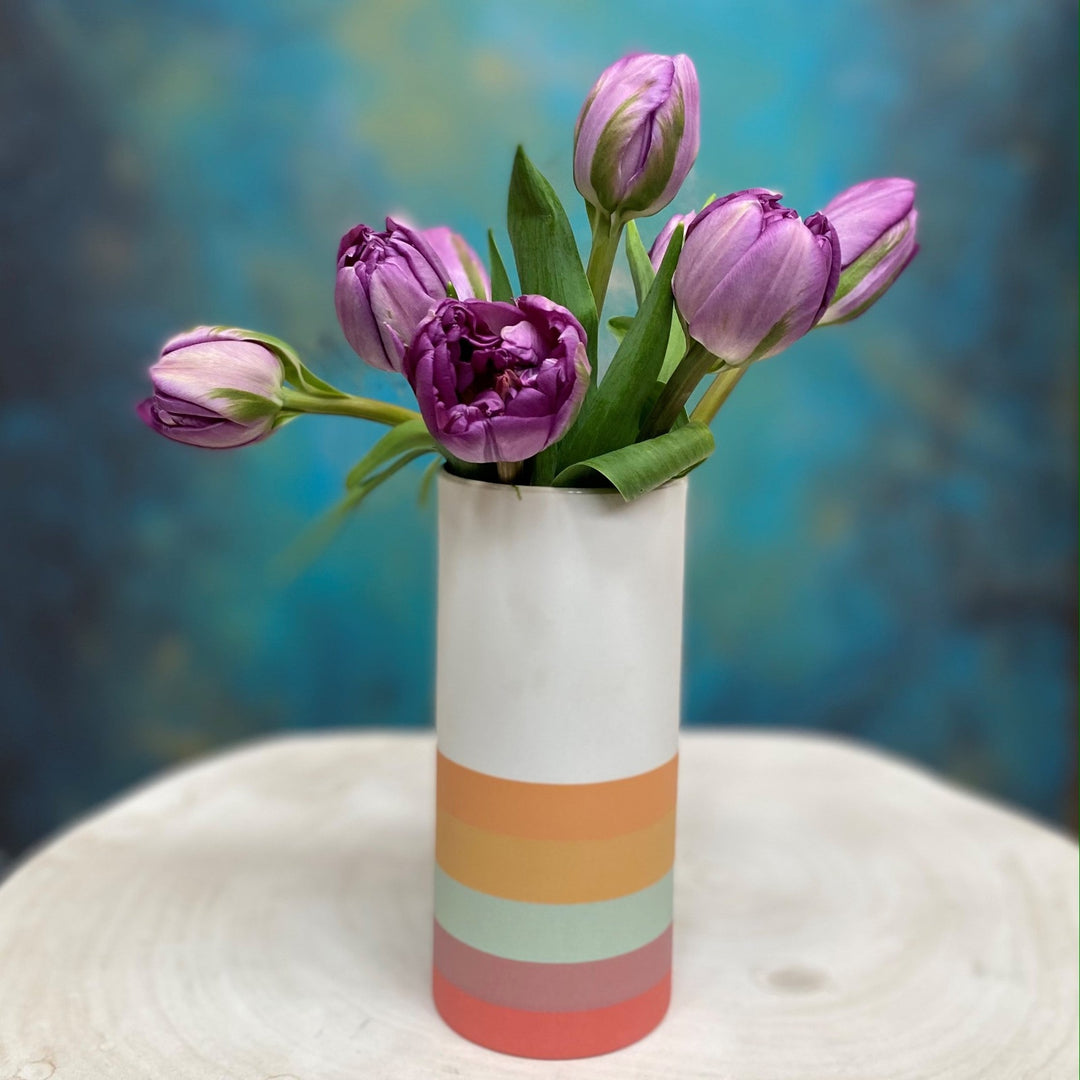 rainbow striped vase with tulips